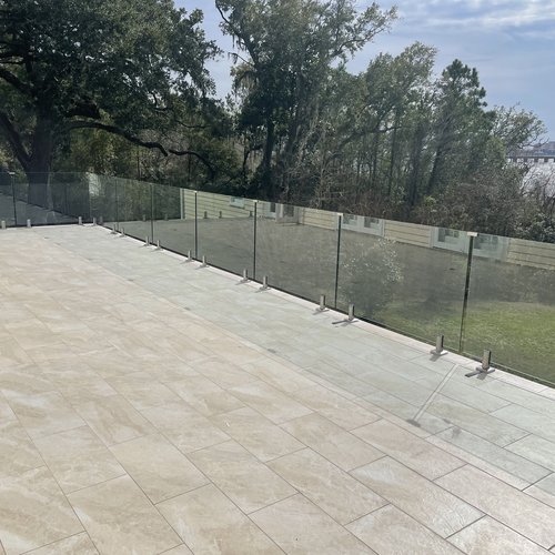 Glass deck railing by Dunn's Flooring Depot